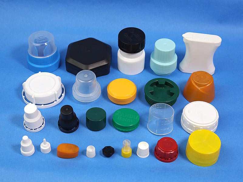Flip top cap mould